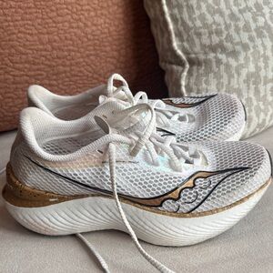 Saucony White and Gold Athletic Shoes